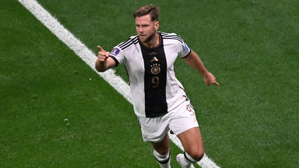 Biografia de Niclas Füllkrug: a jornada de um artilheiro — Conheça a trajetória de Niclas Füllkrug, artilheiro do Borussia Dortmund e peça-chave na seleção alemã, desde sua formação até os grandes momentos.